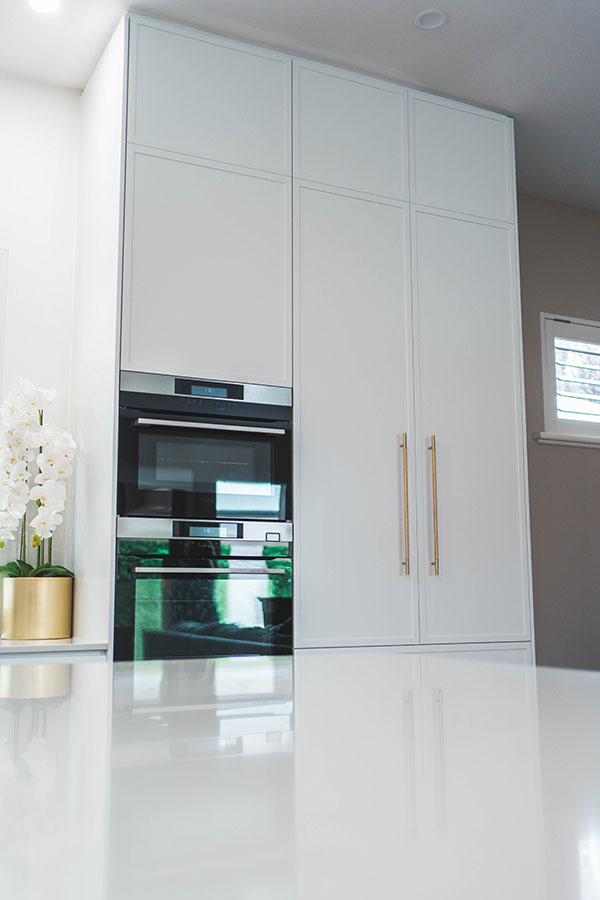 Kitchen installations with efficient cabinetry & built-in appliance sections